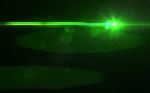 Green Digital Lens Flare In Black Background Horizontal Frame Wa Stock Photo