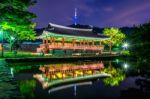 Namsangol Hannok Village And Seoul Tower Located On Namsan Mountain At Night In Seoul,south Korea Stock Photo