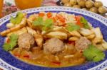 Meat Balls With Rice And Potatoes Stock Photo