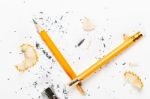 Broken Pencil With Metal Sharpener And Shavings Stock Photo