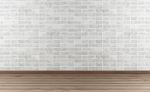 White Stone Wall And Hardwood Floor Stock Photo