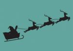 Santa Claus With Reindeer Sleigh In Silhouette Stock Photo