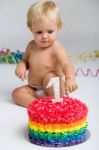 Baby Girl Celebrating Her First Bithday With Gourmet Cake And Ba Stock Photo