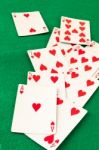 Poker  Cards On Green Baize Casino Stock Photo