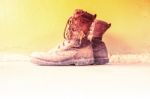 Old Military Boots,old Shoes Concept Background Stock Photo