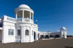 Woman Looking Out From A Colonnade At The De La Warr Pavilion Stock Photo