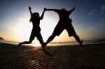 Jumping Couple Stock Photo