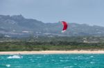 Kitesurfing At Porto Pollo In Sardinia Stock Photo