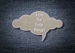 Meaningful Quote On Paper Cloud With Denim Background Stock Photo