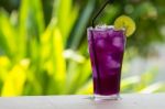 Butterfly Pea Juice With Lemon Stock Photo