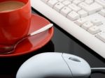 Keyboard And Mouse With Coffee Stock Photo