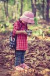 Asian Girl Checking Photos In Digital Camera. Vintage Effect Tone Stock Photo