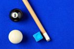 Billiard Balls, Cue And Chalk In A Blue Pool Table Stock Photo