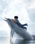 Boy Riding On A Dolphin,3d Illustration Stock Photo