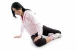 Side View Of Female Doing Exercise On White Background Stock Photo