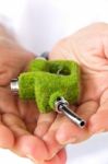 Hand Holding Eco Fuel Nozzle Stock Photo