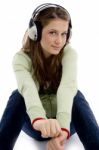 Sitting Female Listening Music Stock Photo