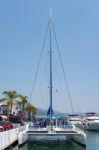 View Of A Catamaran In The Harbour At Porto Banus Stock Photo