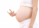 Love Sign Hand Abdomen Of Pregnant Woman On White Background Stock Photo