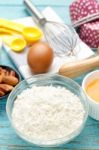 Flour With Baking Ingredients On Wood Background Stock Photo