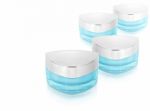 Many Blue Triangle Cosmetic Jar On White Background Stock Photo