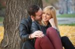 Young Couple In Park Stock Photo