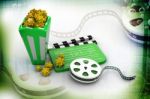 A Movie Reel With Clapboard And Popcorn Stock Photo