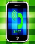 Twenty Four Seven On Phone Displays Open 24/7 Stock Photo