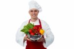 Male Chef Holding Vegetables Bowl Stock Photo