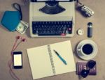 Typewriter And Personal Items On The Table Stock Photo