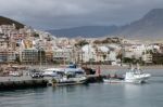 Boats Moored In Los Christianos Harbour Stock Photo