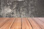 Top Of Wood Table On Old Concrete Wall Background Stock Photo