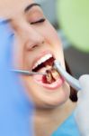 Cute Young Woman At The Dentist. Mouth Checkup Stock Photo