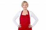 Smiling Woman Chef Posing Over White Stock Photo