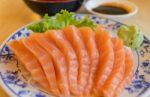 Salmon Fish With Wasabi And Sauce On Table Wood In Restaurant Stock Photo