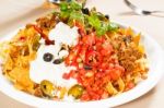 Fresh Nachos And Vegetable Salad With Meat Stock Photo