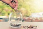 Close Up Of Glass Bottle With Hand Stock Photo