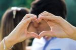 Happy Young Couple Having Fun In A Park Stock Photo