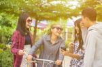 Group Of Asian Teenager Walking In The Park  Stock Photo