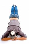 Young Man Lying On Floor Stock Photo