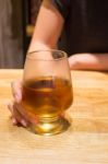 Woman Having Alcoholic Drink In The Bar Stock Photo