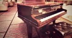 Grand Piano At Hotel Bar Area Stock Photo