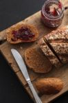 Dark Multigrain Bread Whole Grain And Jam Fresh Baked On Rustic Closeup Stock Photo