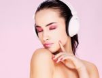 Woman With Headphones Stock Photo