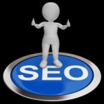 Seo Button Shows Internet Marketing And Optimizing Stock Photo