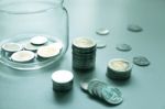 Coins And Glass Jar Stock Photo