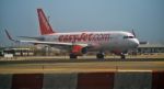 Airplane Taxiing In A Airport Stock Photo