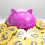 Piggybank Surrounded In Coins Showing Britain Wealth Stock Photo