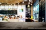 Selected Focus Empty Brown Wooden Table And Coffee Shop Or Resta Stock Photo