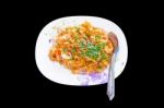 Macaroni Pasta In Tomato Sauce With Chicken, Thai Style Stock Photo